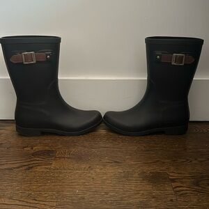 Black rain boots with buckles